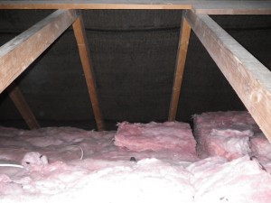 Roof insulation layered at ceiling level