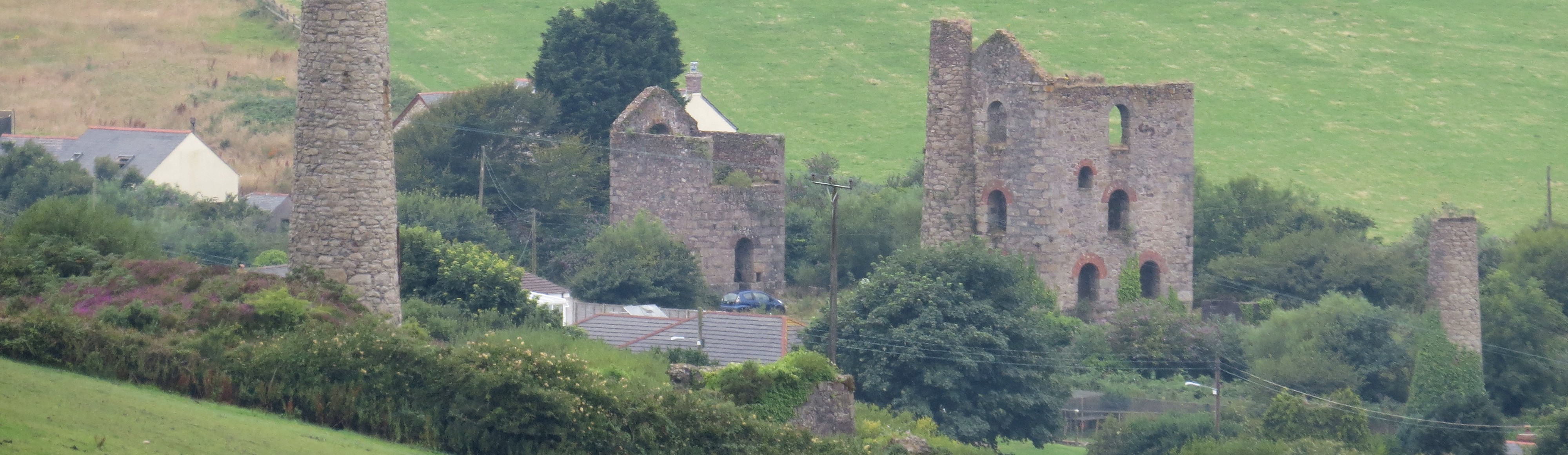 Abandoned Cornish mines near houses