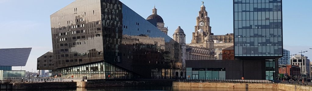 Modern buildings completed on Liverpool's waterfront with more traditional properties in the background
