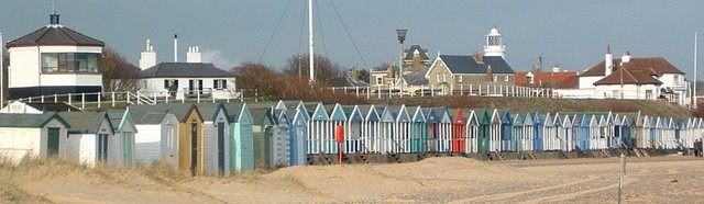 Southwold beach houses on the coast of Suffolk near Orfordness Lighthouse