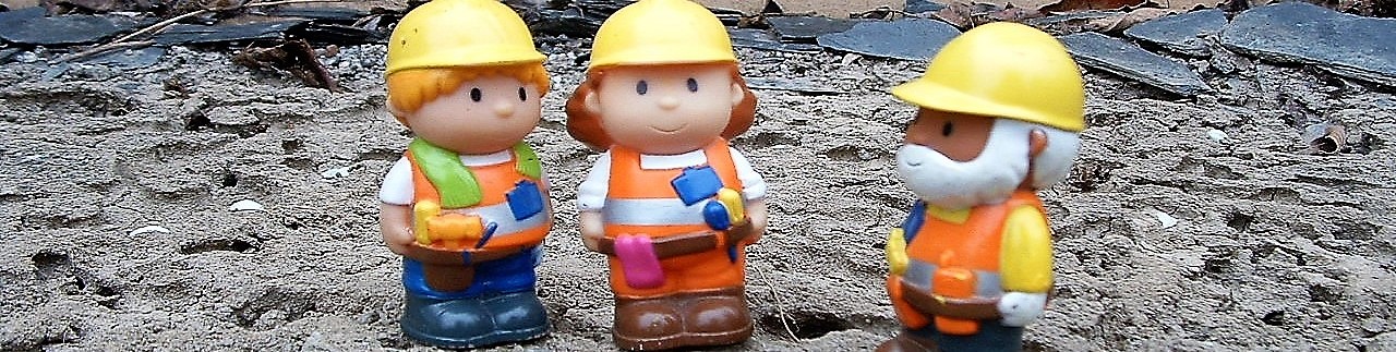 Builders on building site
