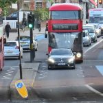 London buses on busy street