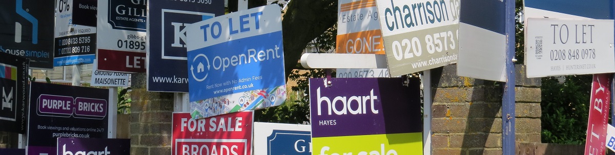 Rental housing estate agents advertising boards