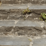 Old stone steps leading to house and home