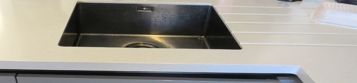 silica worktop in kitchen with sink and draining slats