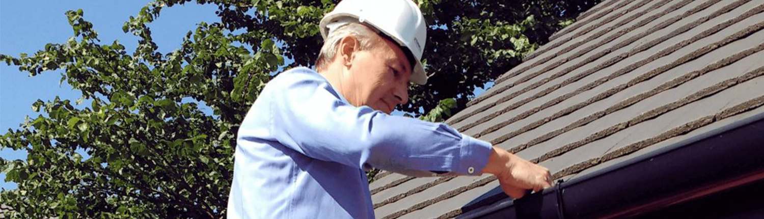 Chartered Surveyor during inspection