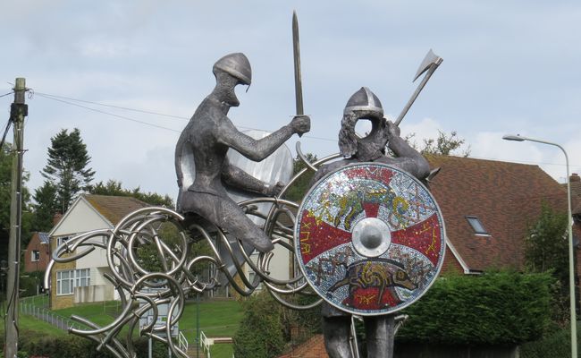 battle-metal-sculpture-buildings