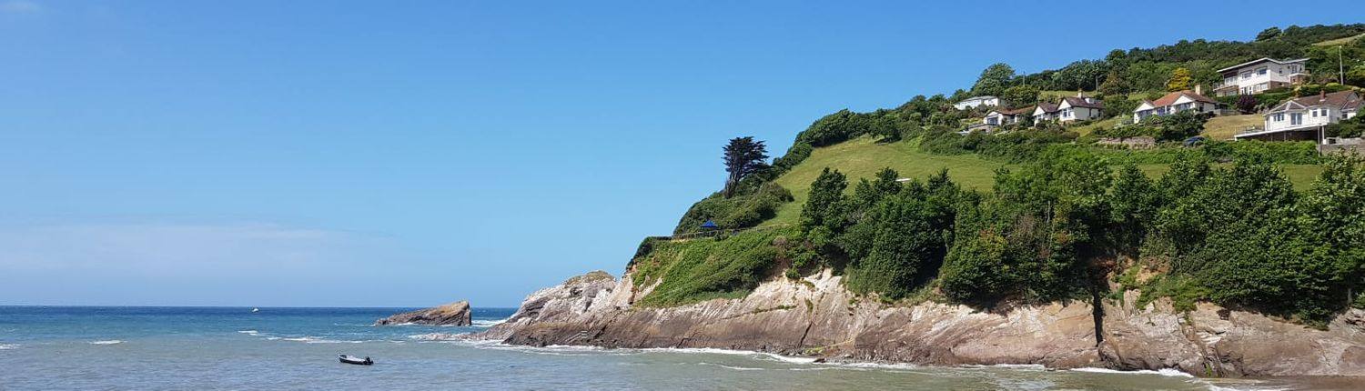 Properties atop some cliffs in Combe Martin