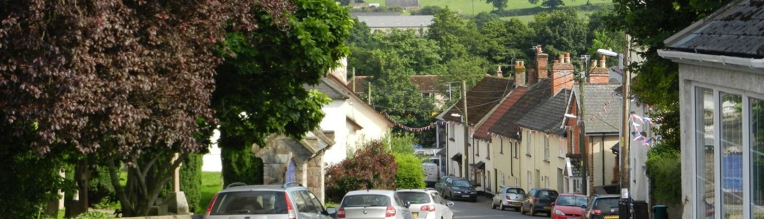 A street in Uffculme with period terraced houses.